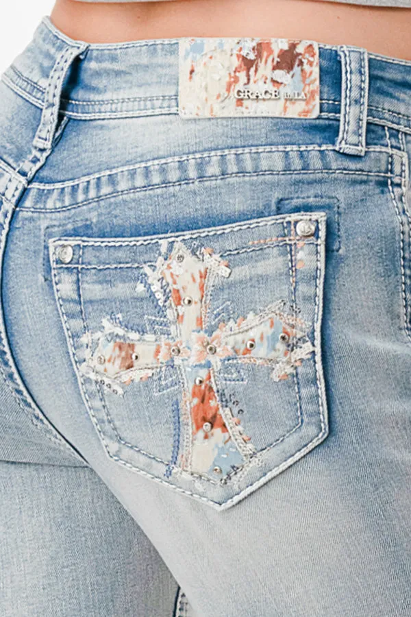 Mid Rise Bootcut Jeans with Cow Hide Trim featuring Cross Design