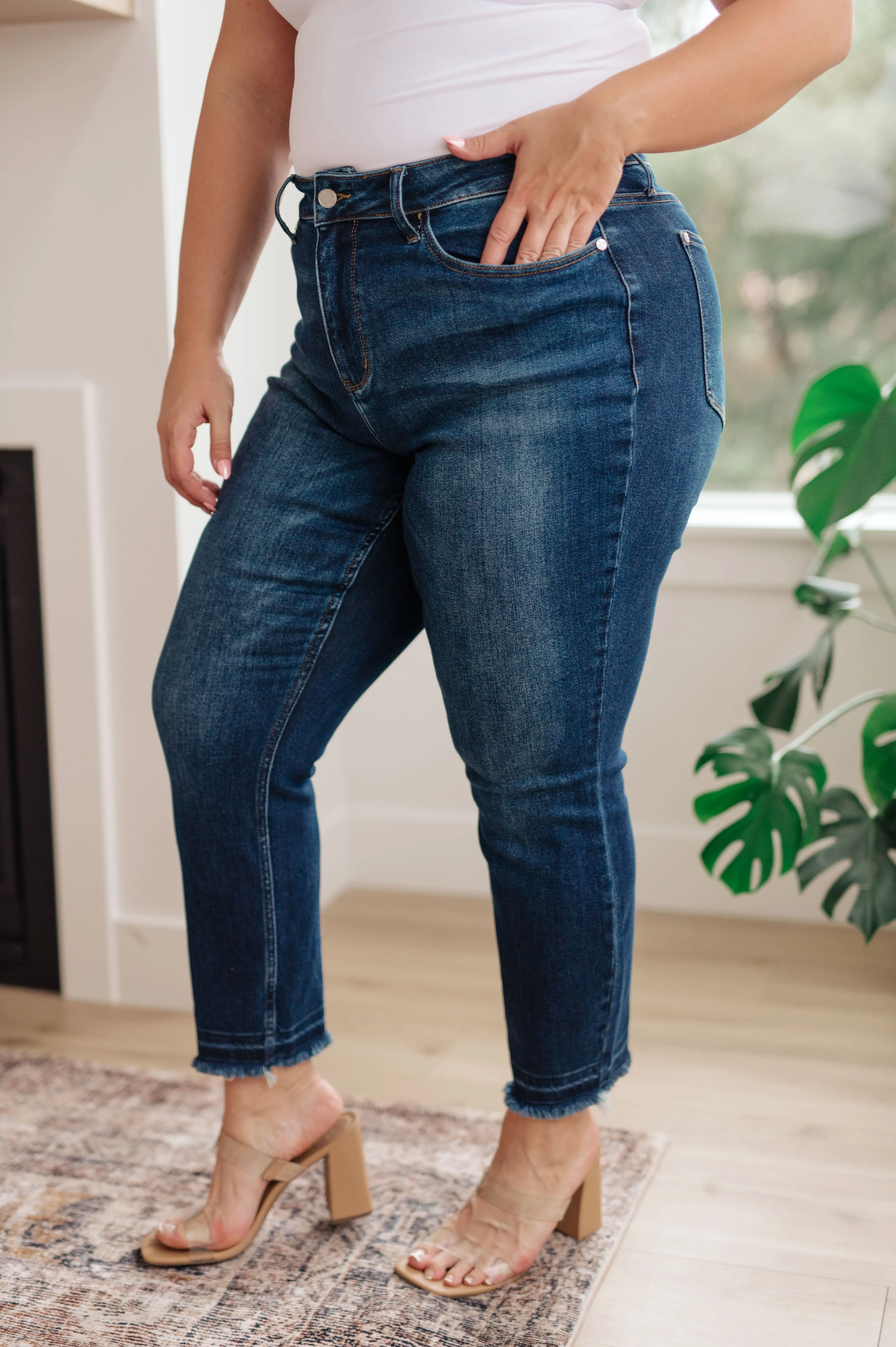 High Rise Release Hem Slim Jeans