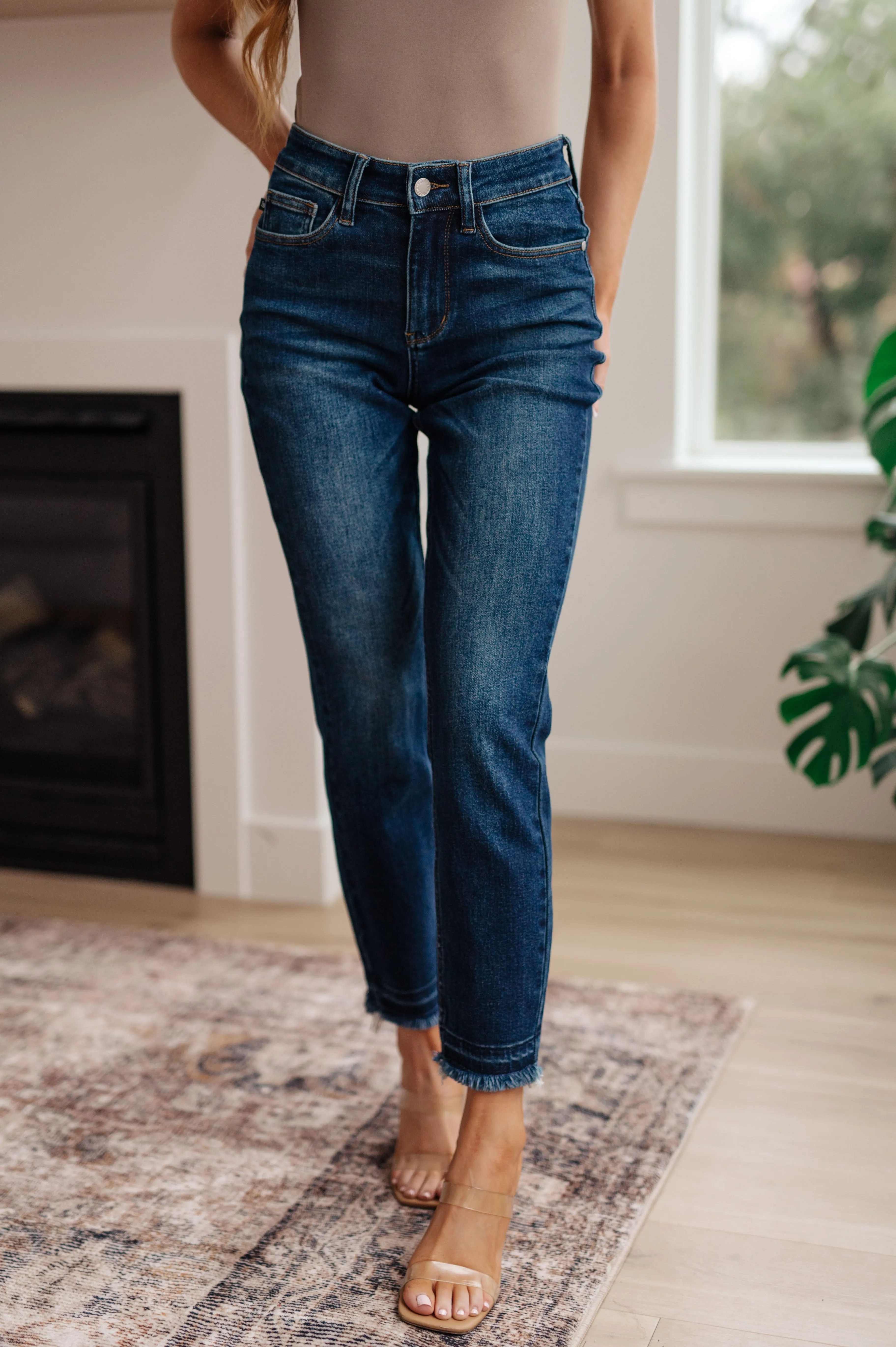 High Rise Release Hem Slim Jeans